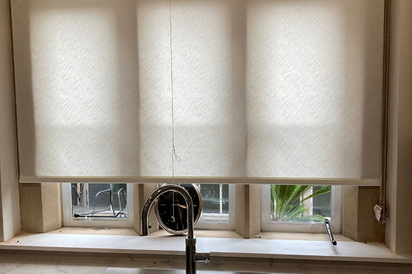 Roller blind in kitchen